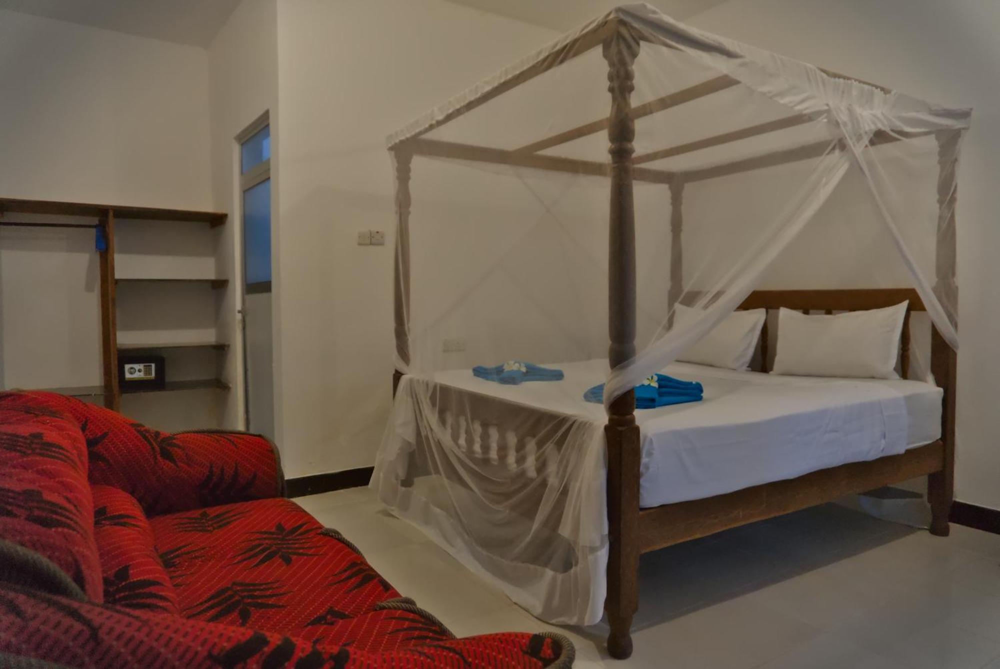 Cocolala Beach House Нунгві Номер фото