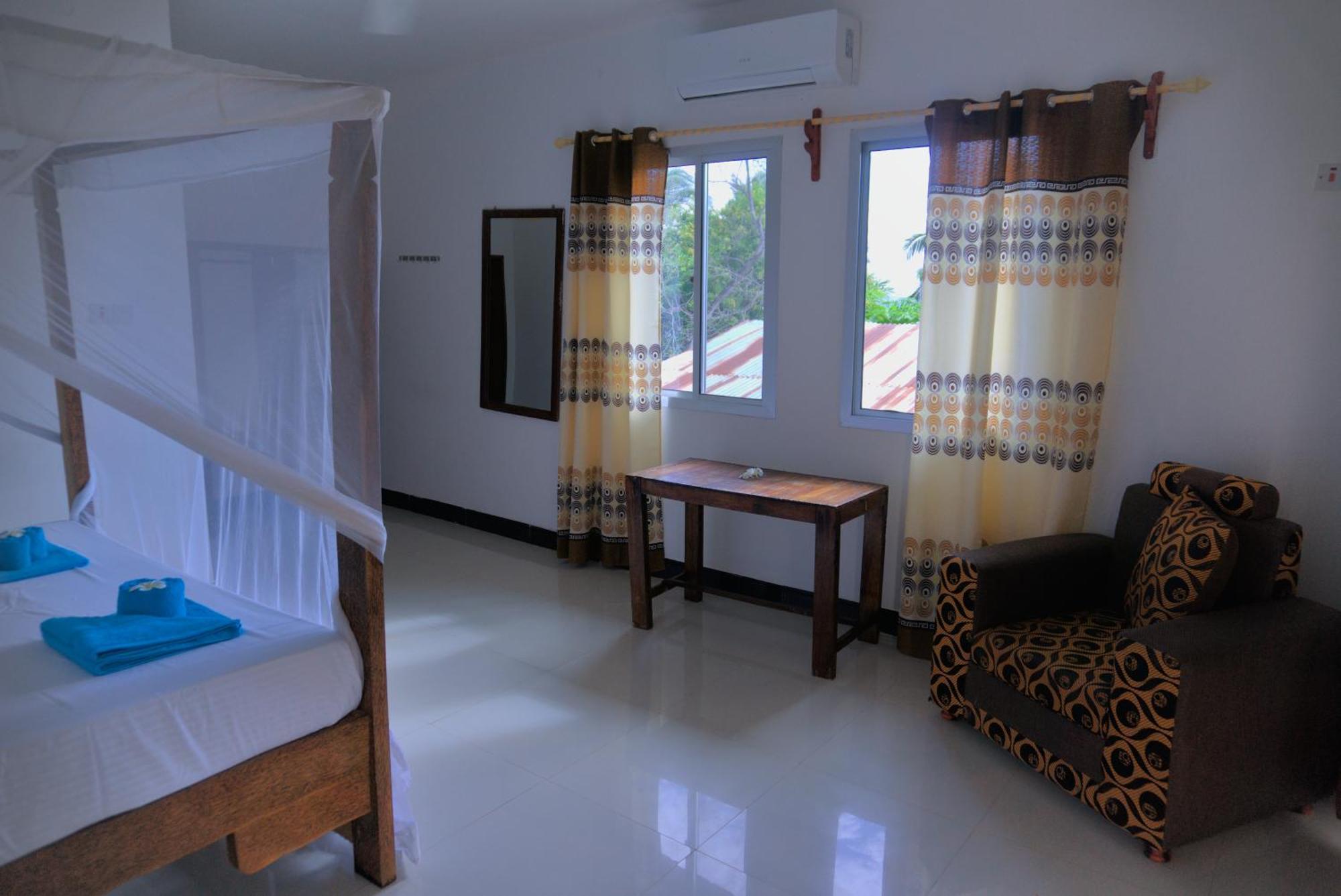 Cocolala Beach House Нунгві Номер фото